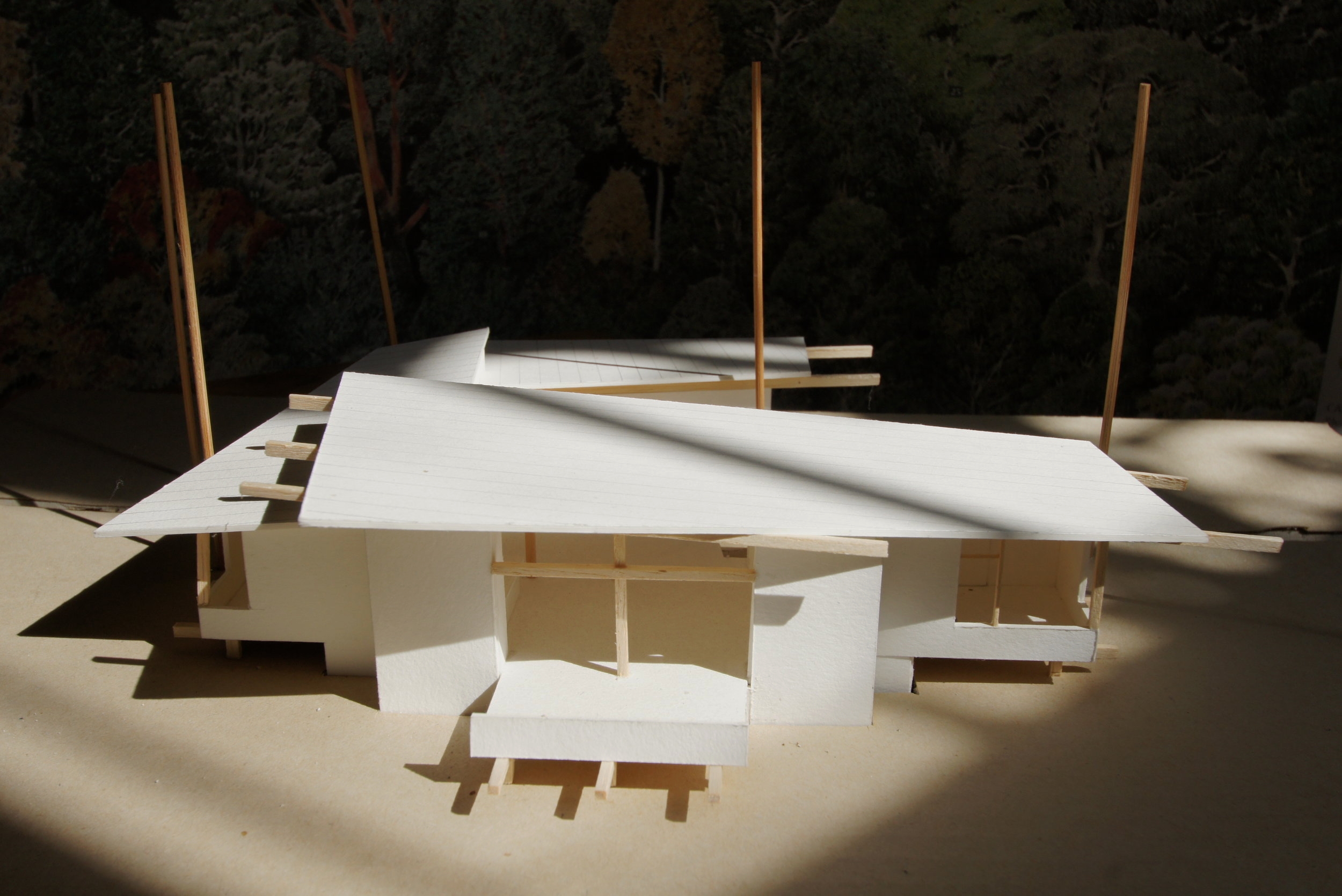 The main living area opens to the view. Bedrooms are on each end.