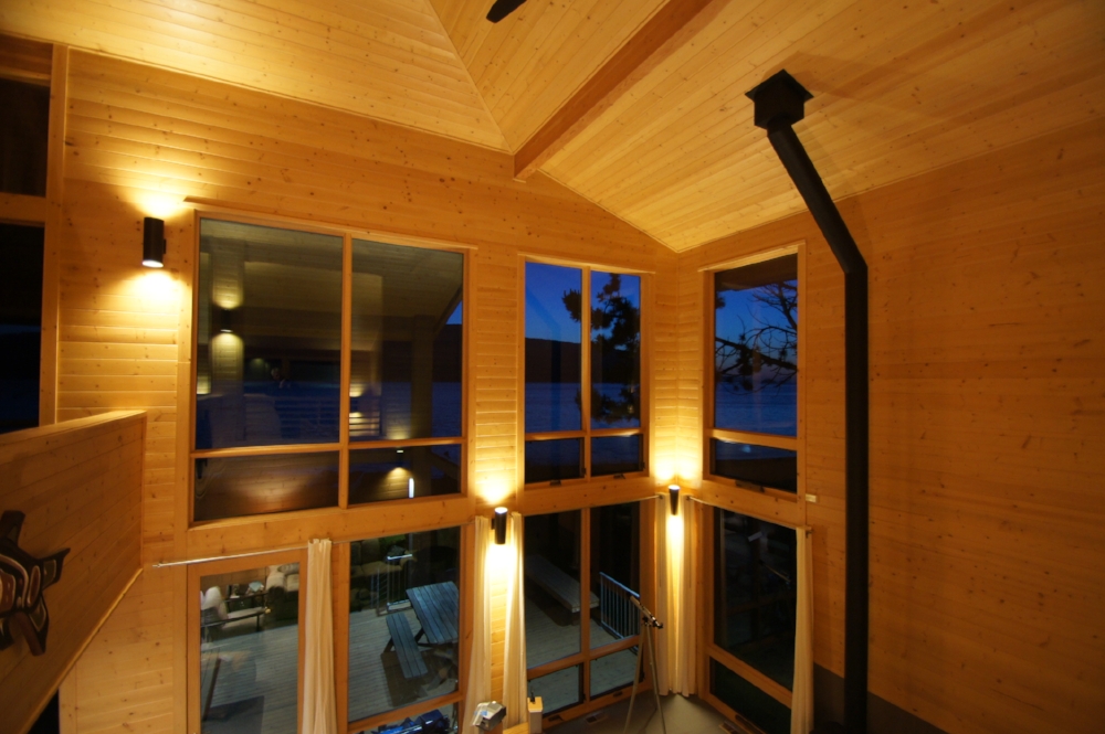 the main living area with large windows facing the view.