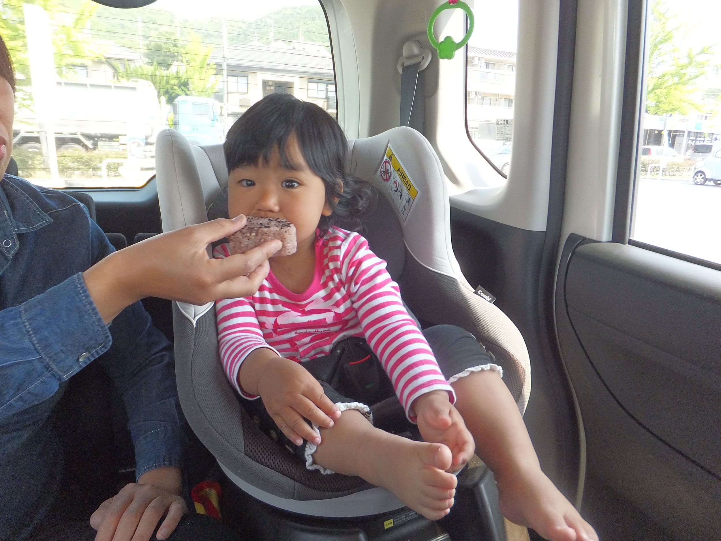 Of course before we went Anna wanted to have a snack. She loves Onigiri also known as a Omusubi or rice ball. This one was made with red beans and red rice. 