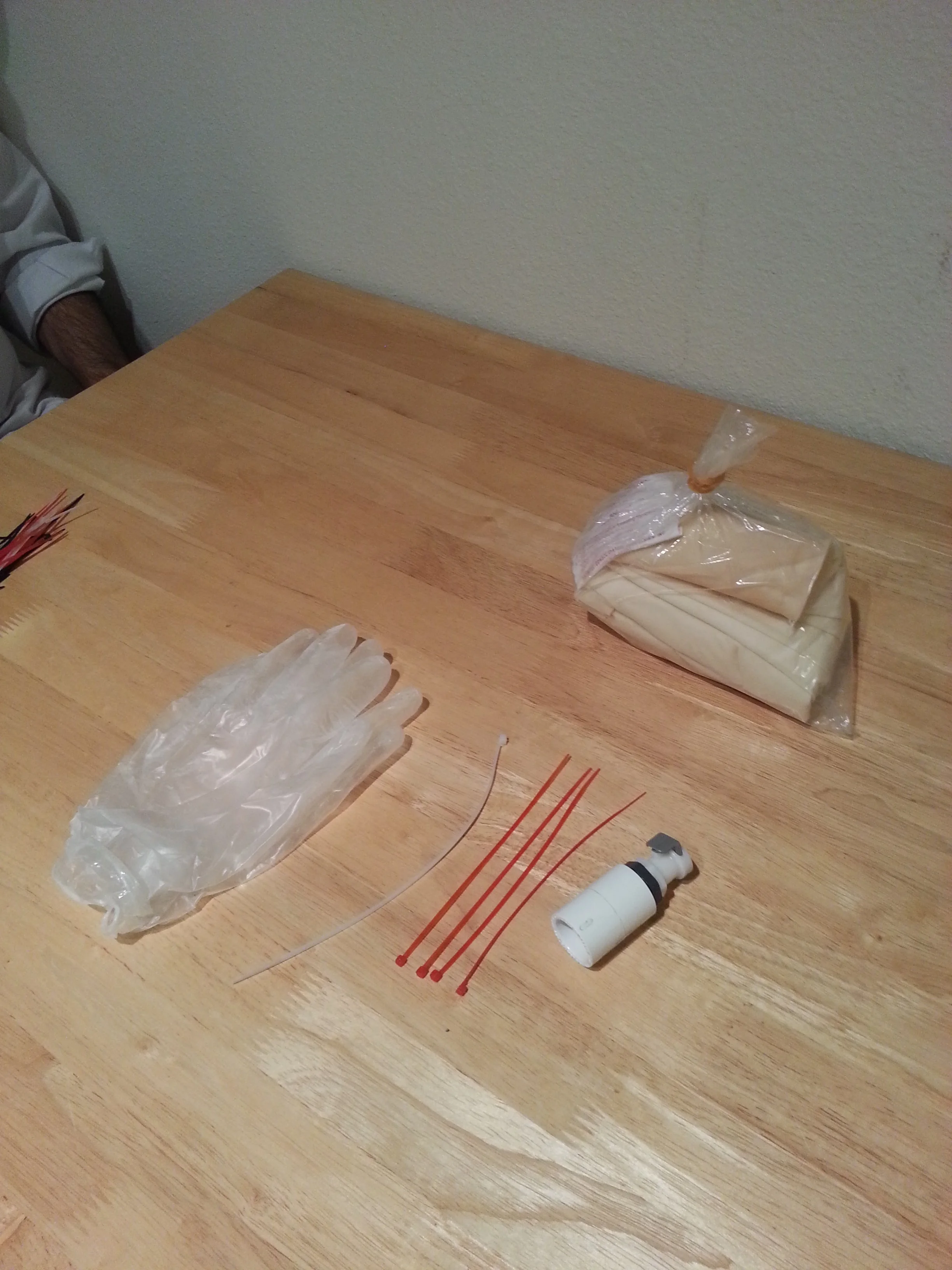 Unpack all the materials to prepare the balloon inflation adapter.
