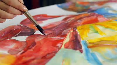 stock-footage-woman-artist-painting-watercolor-paints.jpg