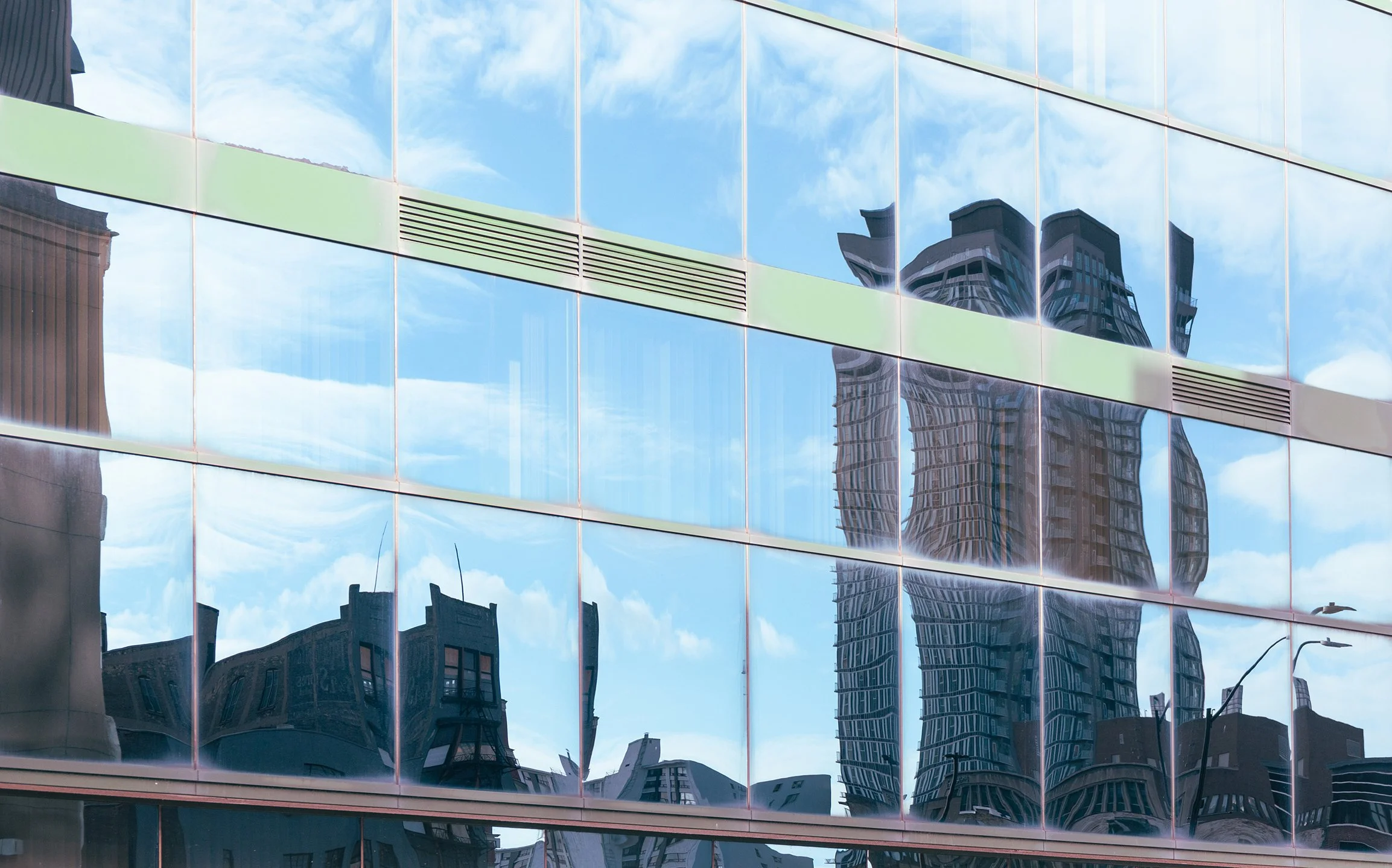 Bent Glass - 2023 - Several downtown London, On buildings are reflected, warped, in the glass of a facing building.