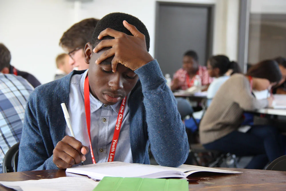 A Student Concentrates on His Project