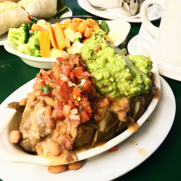 An amazing loaded baked potato that I got at a DINER 25 miles outside of Yosemite.