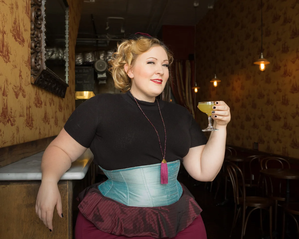 Corset: Pop Antique " Bombshell " | Model: Nicole Simone | Location: Two Sisters Bar & Books | Photo © Alyxander Ryan