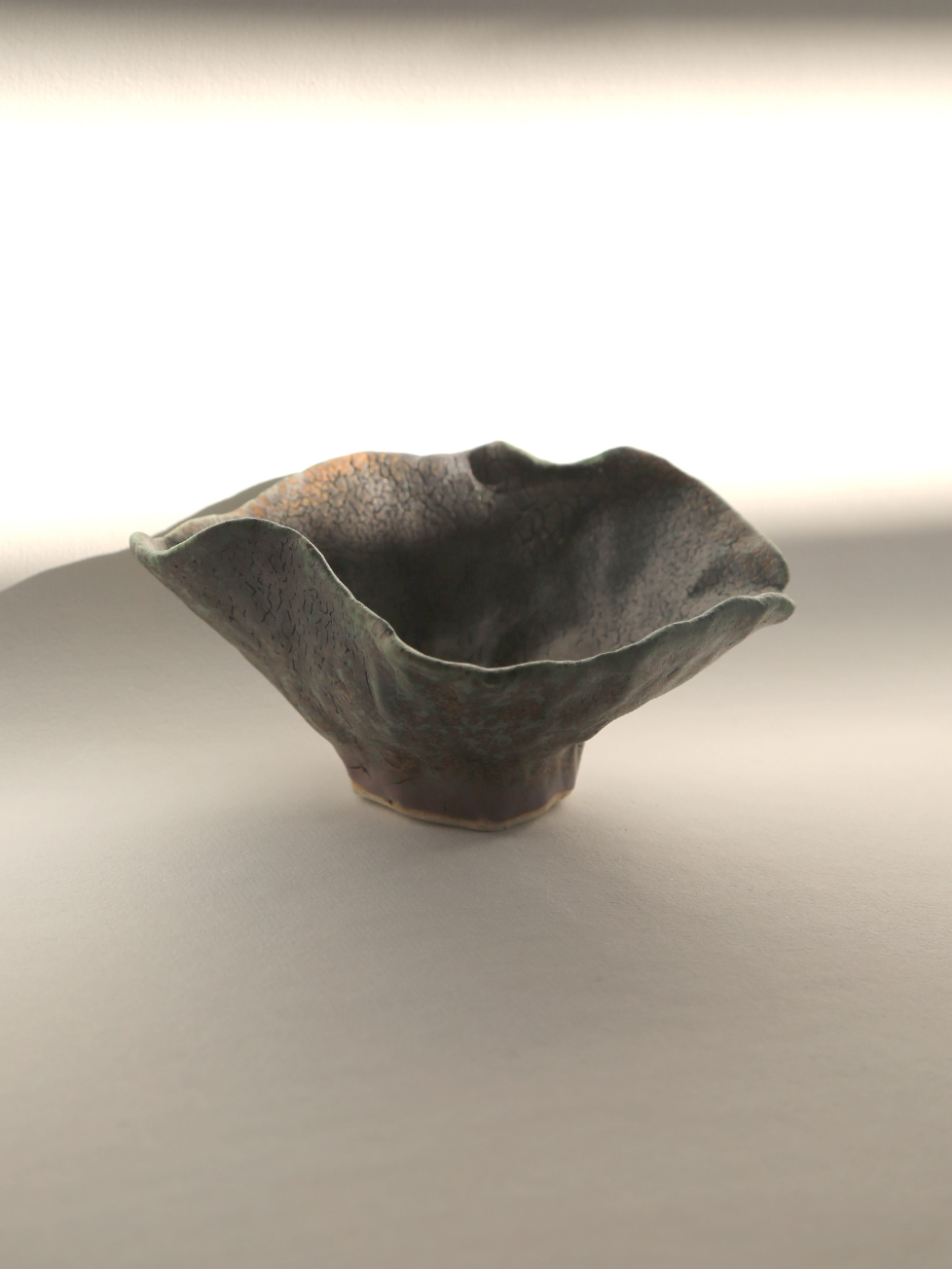 Cracked black floral bowl