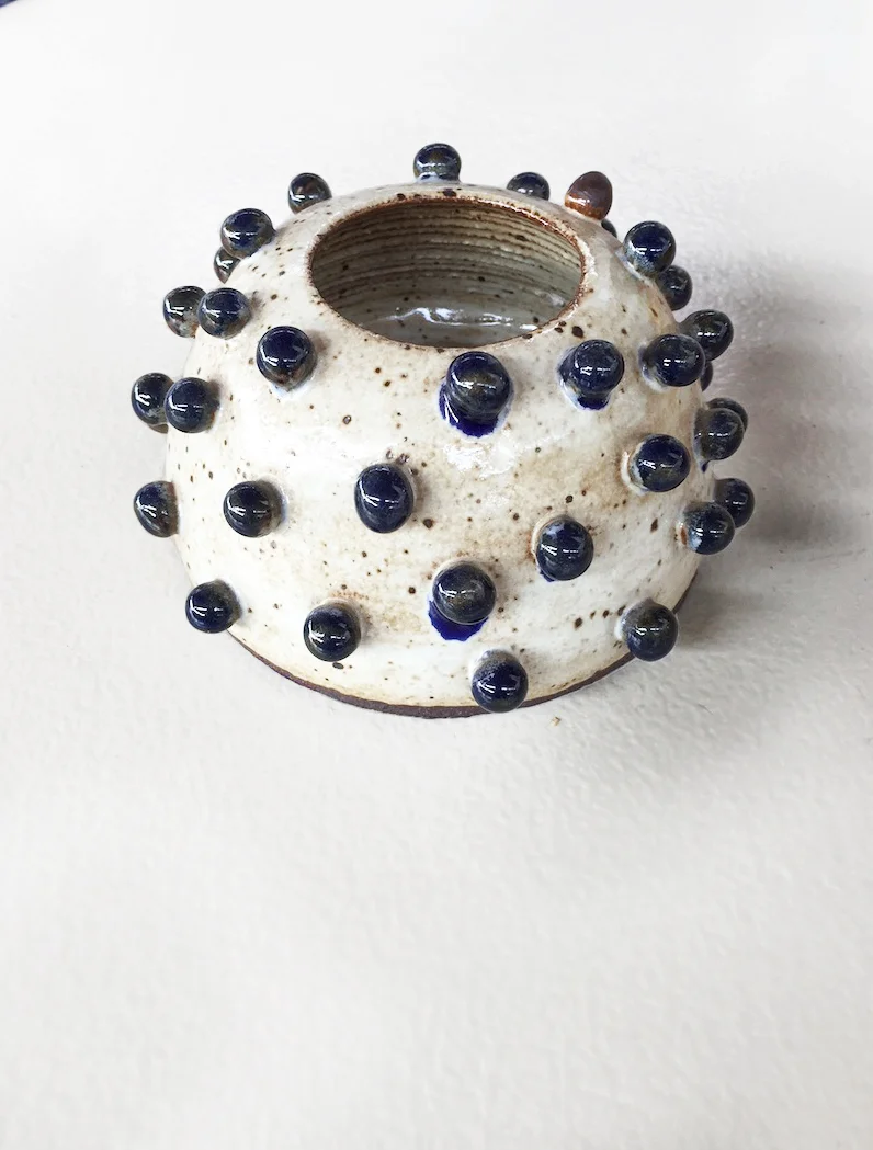Small pot with blue beads