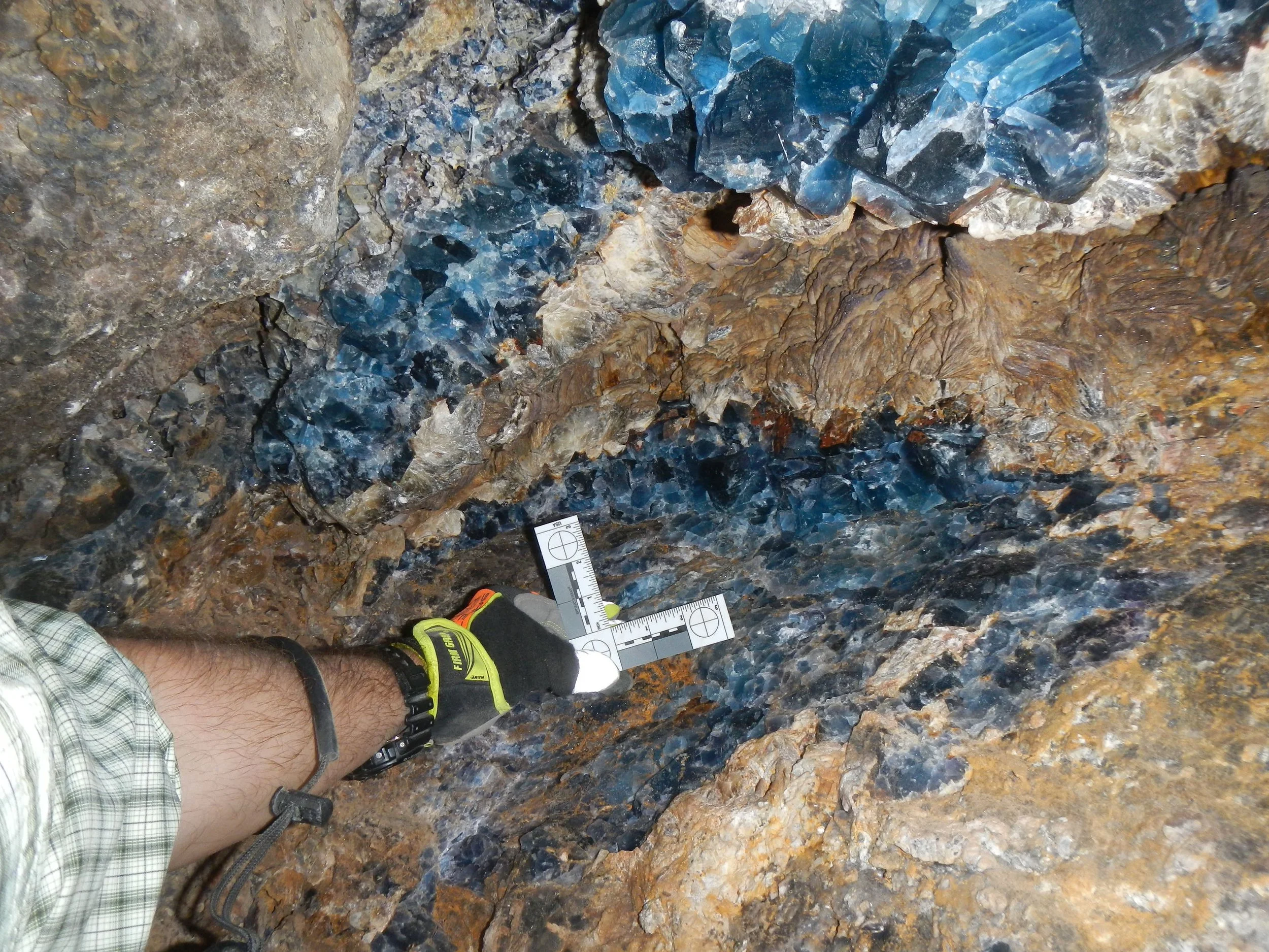 Using Ruler for Scale with Large Fluorite and Barite Formations in the Ceiling of the Upper Adit Ceiling