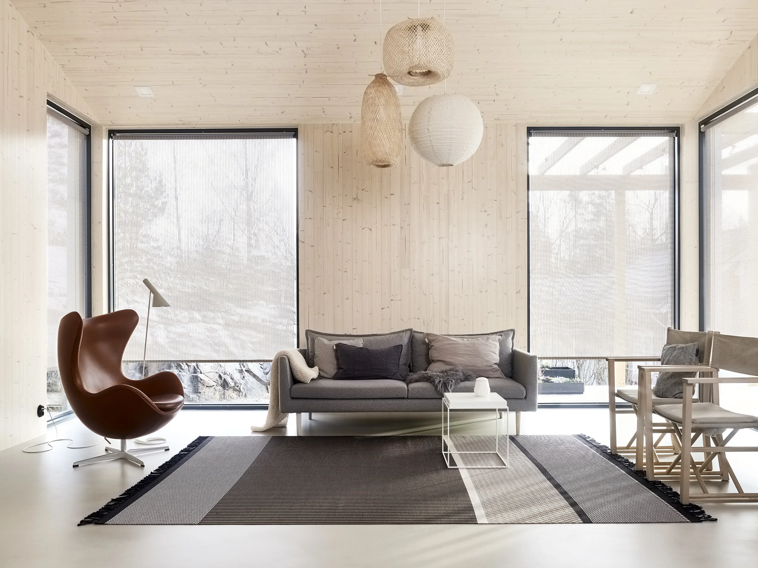 1433215 San Francisco nutria-stone paper yarn carpet and 21311 Vista white-stone cahin operated roller blinds.