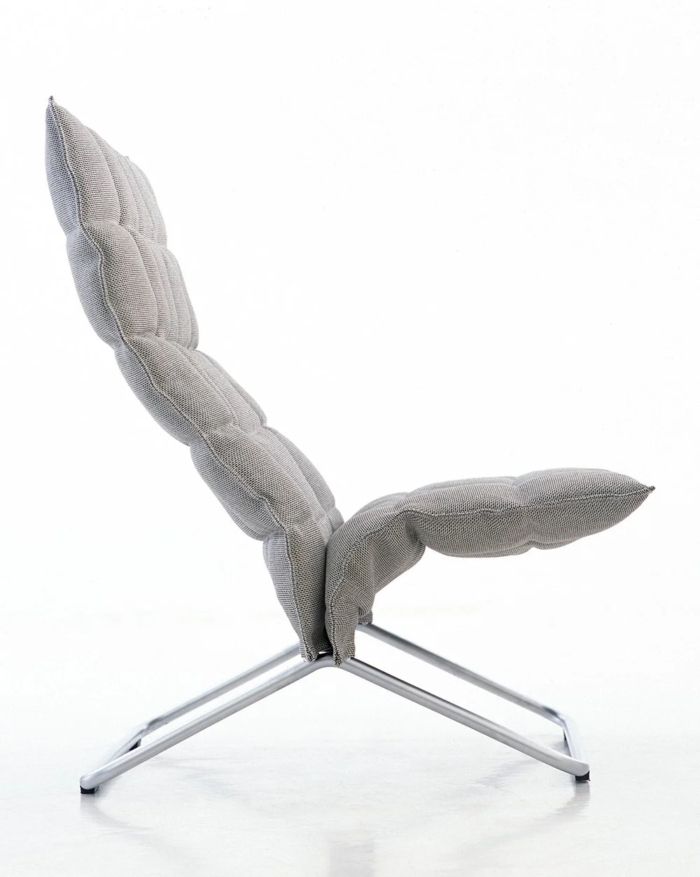 The first version of the k chair was launched in 2004 with the tubular feet and a design reminiscent of a camping chair. 