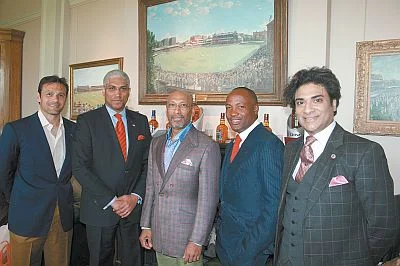 From left, Mark Ramprakash, T&T High Commissioner to London Garvin Nicholas, Andrew Ramroop, Brian Lara and Neil Latchman at the unveiling of Ramroop's Savile Row Collections.