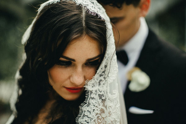 bride-wearing-spanish-veil-mantilla-alencon-lace.jpg