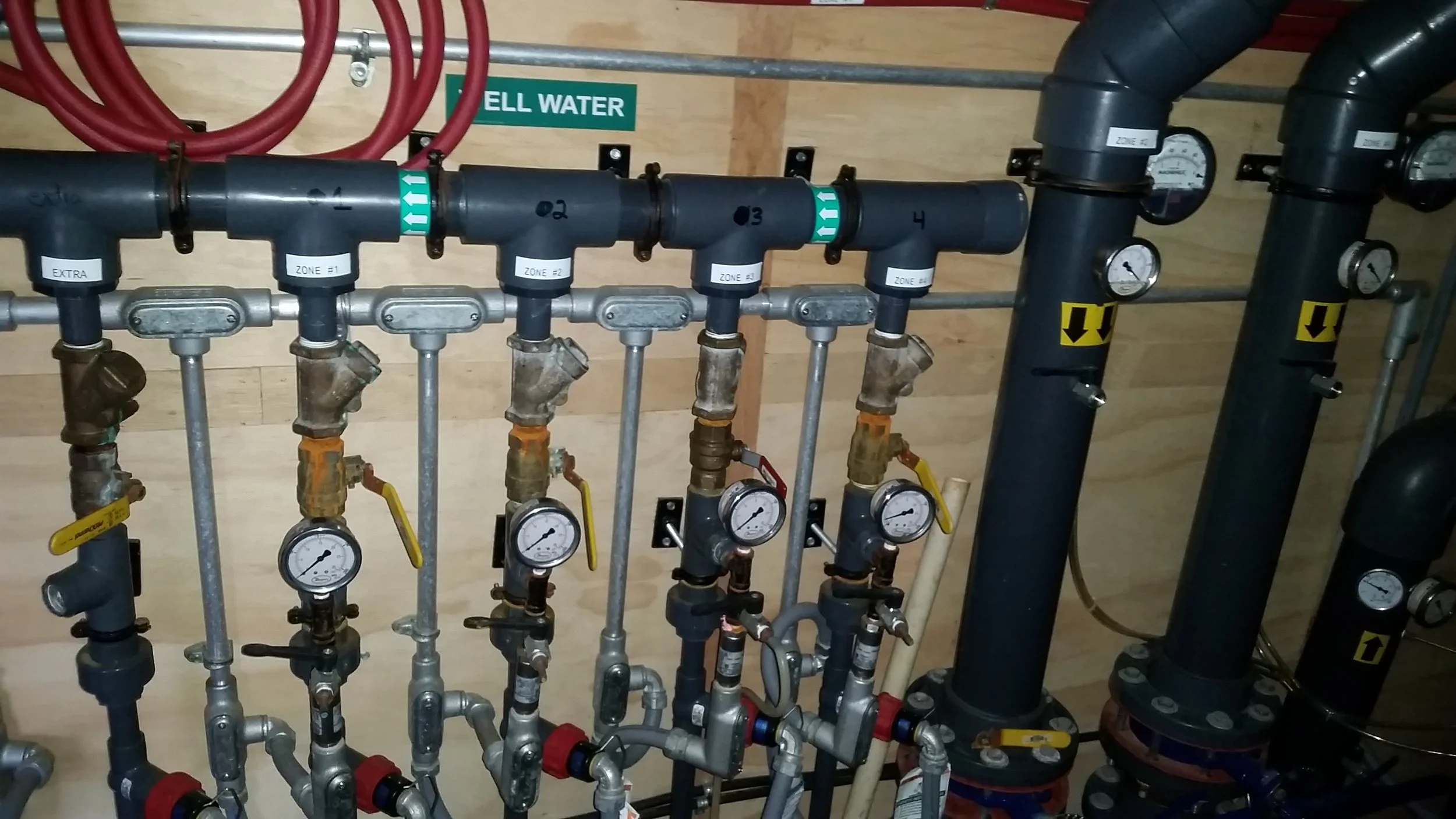 Valves and piping in place as part of the multi-phase extraction system used for remediation at the site.