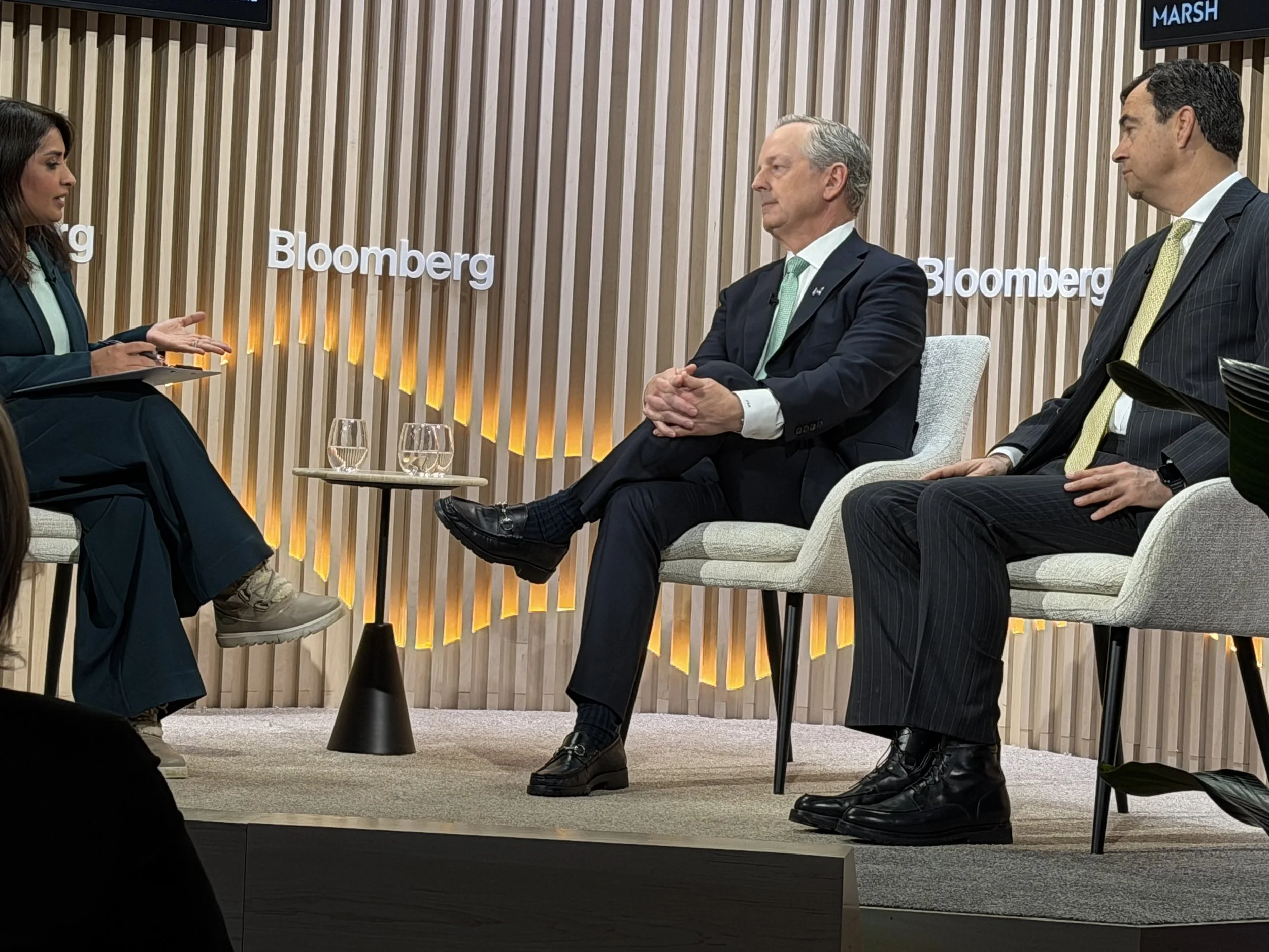 Millika Kapur, India Director at Bloomberg New Economy (left), John Doyle, President &amp; CEO of Marsh (center), and Christian Ulbrich, CEO &amp; President of JLL (right)