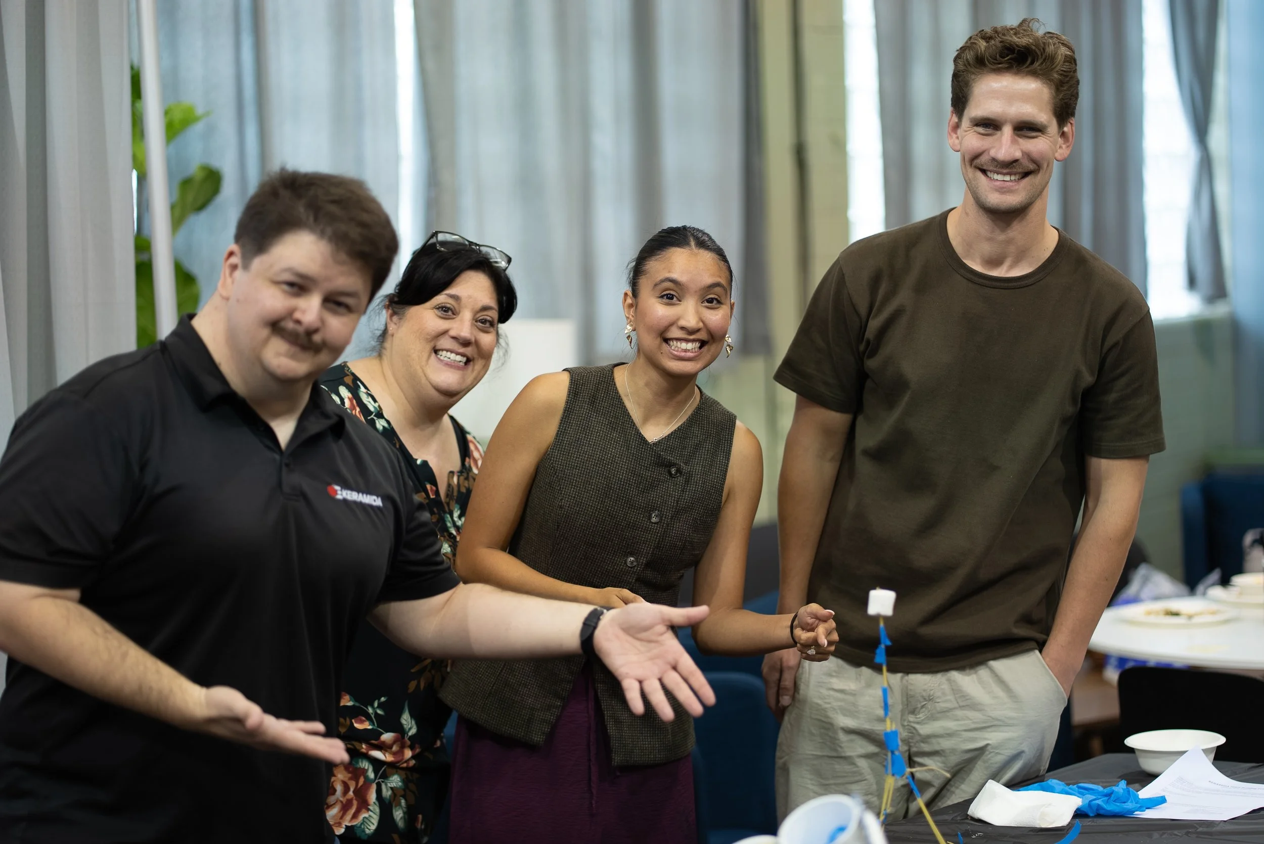  And it's still standing. (Left to right: Jay Nickel, Project Manager, Land Services; Roxanne Marsh, Admin; Jenae Mona, Staff Engineer; and Nick McCreary, MS, LEED AP BD+C, Senior Vice President, Sustainability.) 