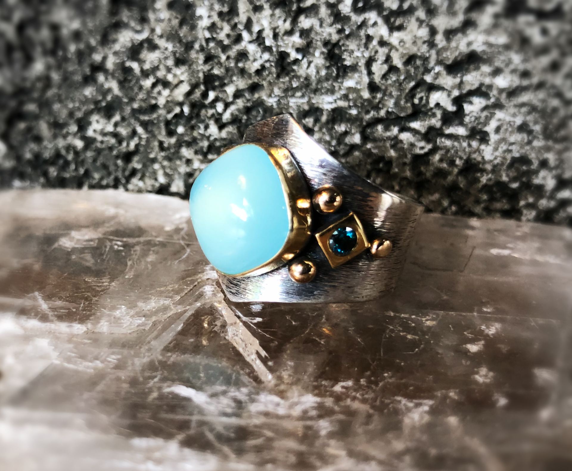Open blue chalk and blue diamond ring side.png
