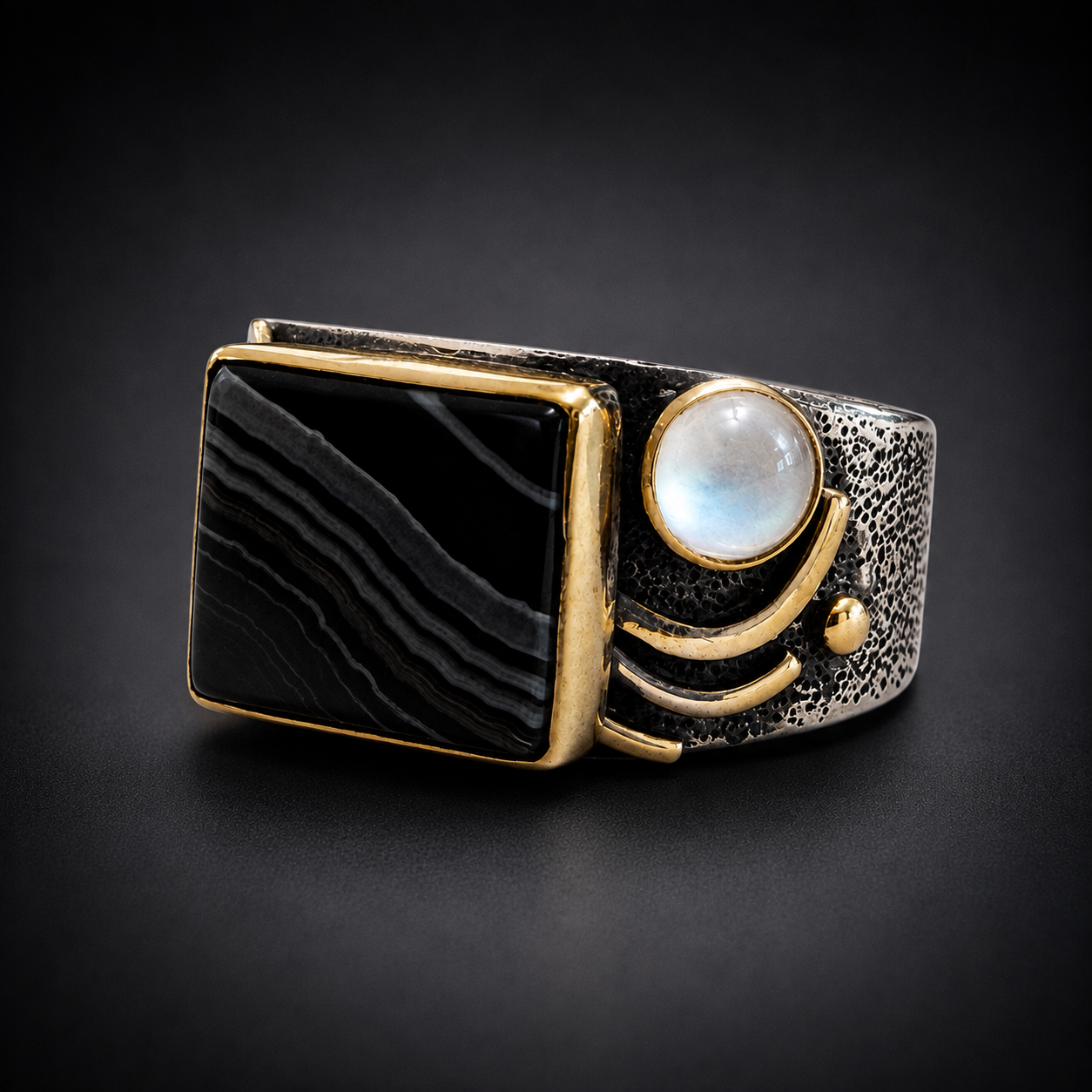 Tuxedo wave ring moonstone shot.png