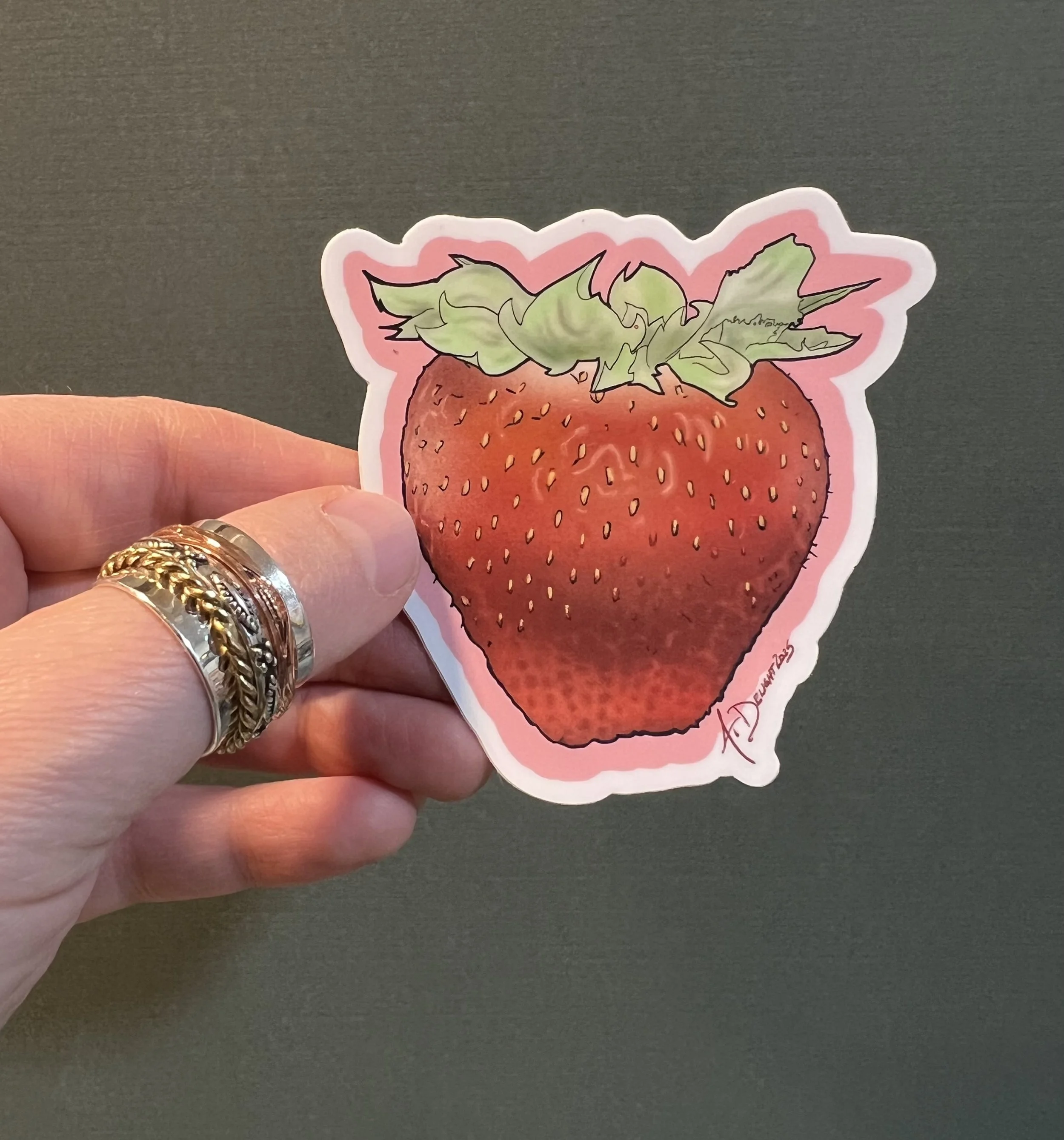 Strawberry sticker with hand .jpg