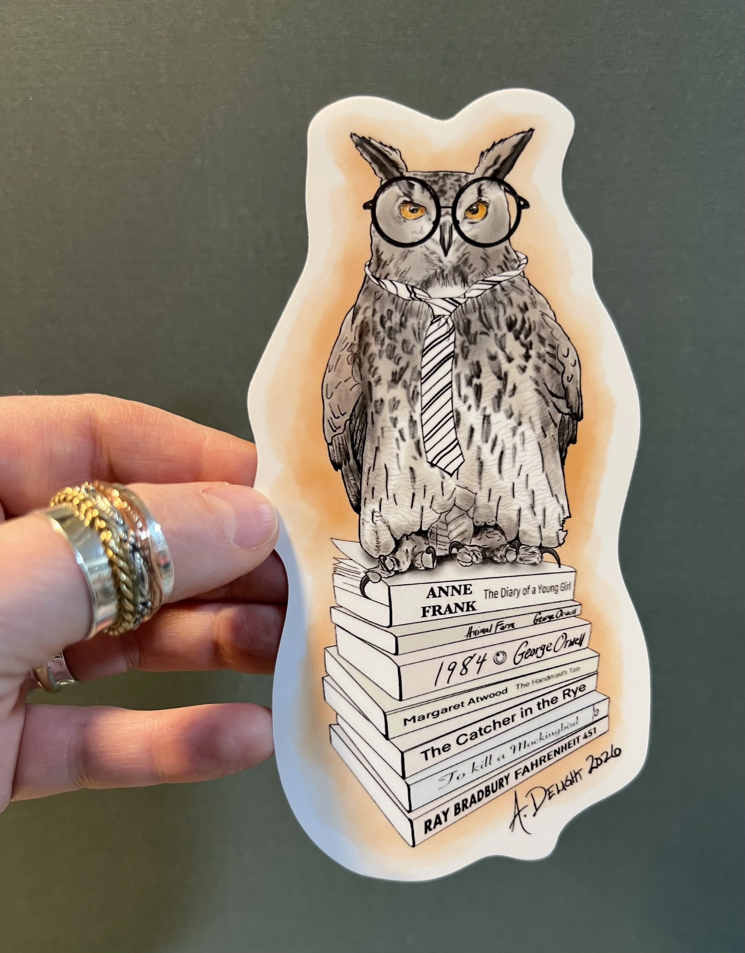 Owl sticker with hand .jpg