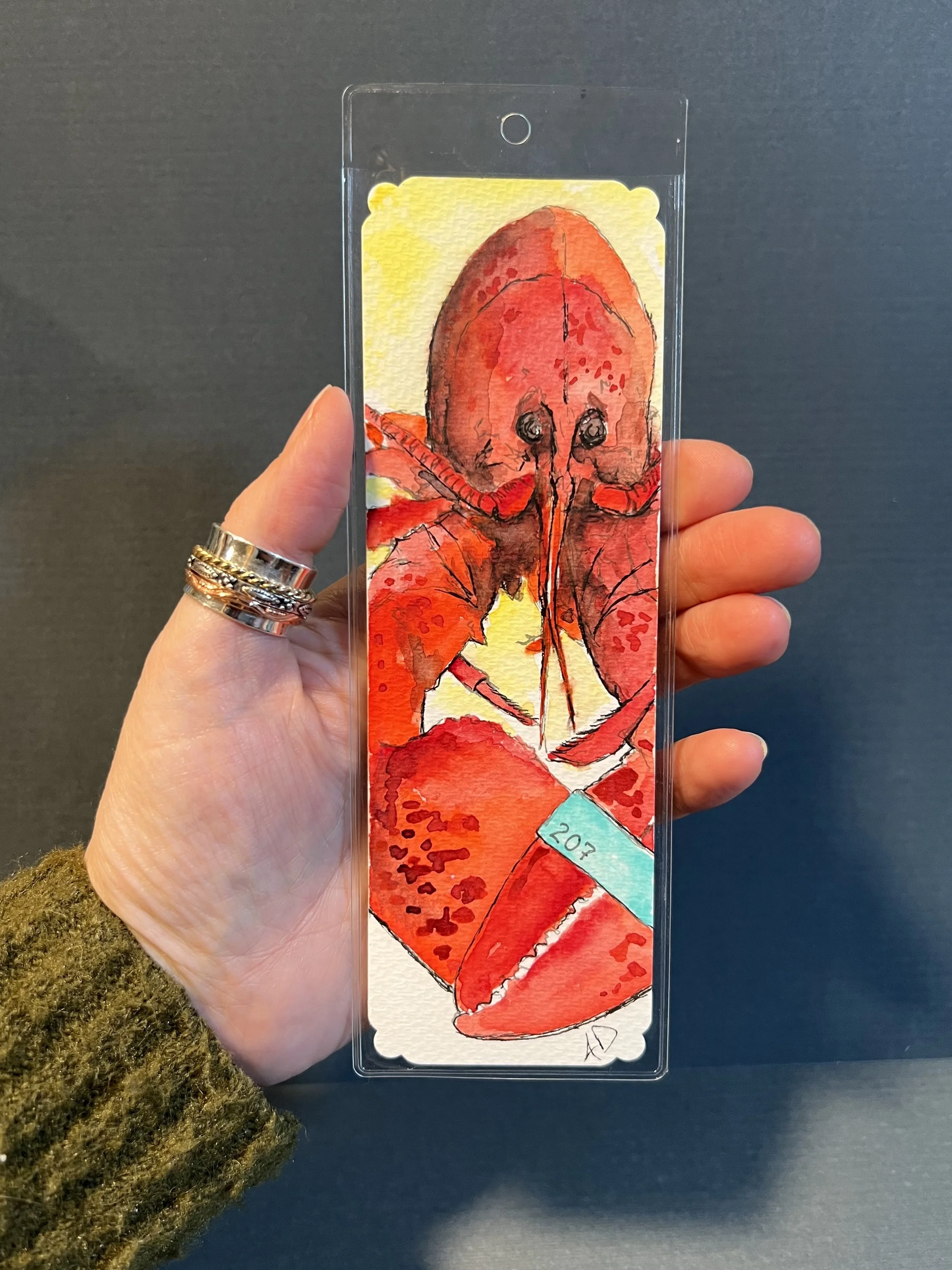 Lobster Bookmark with hand.jpg