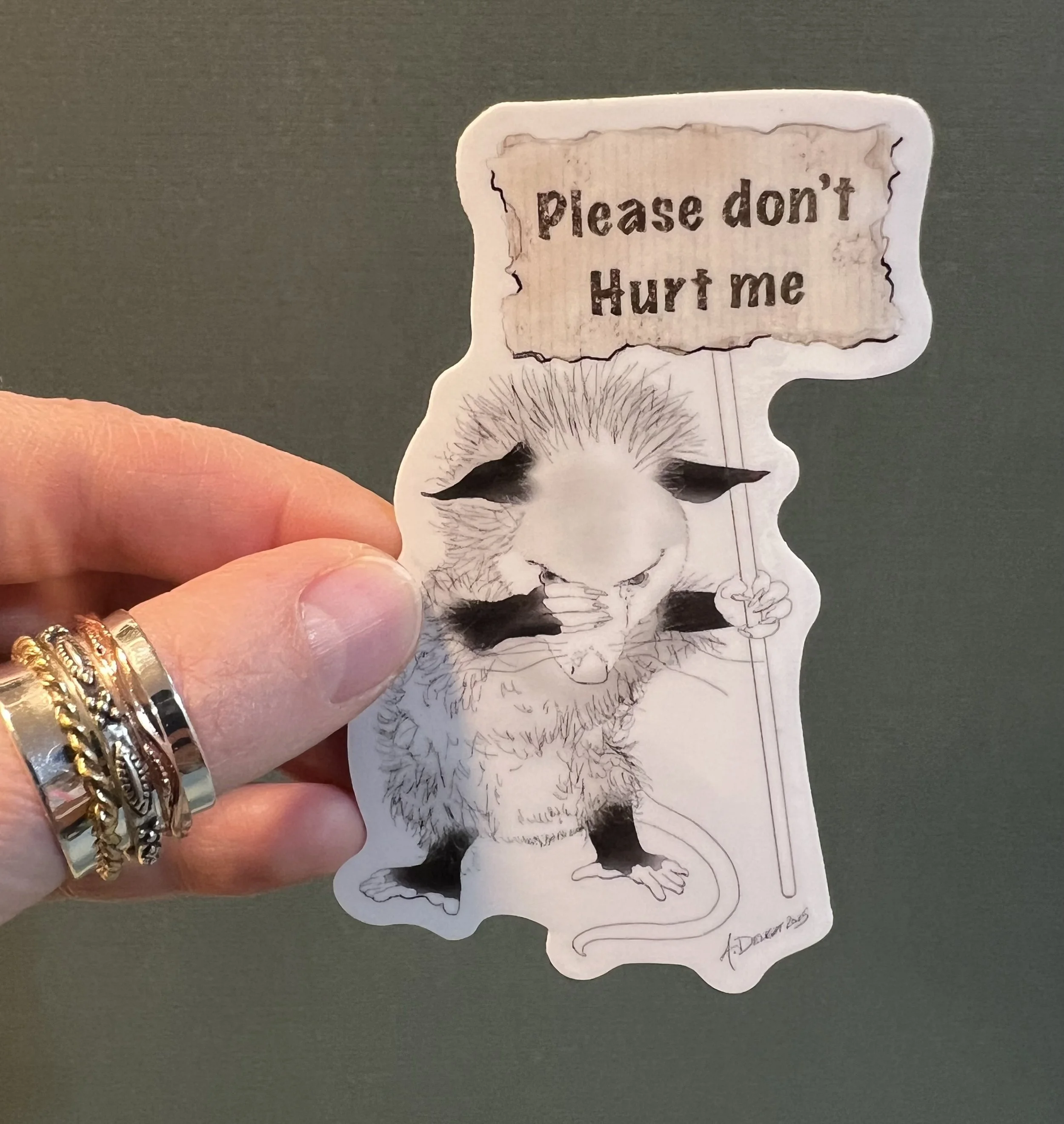 Be Kind sticker with hand.jpg