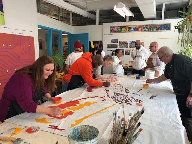 A COMMUNITY MURAL WITH BERKS COUNTY PRISON WARDEN &amp; FORMER INMATES