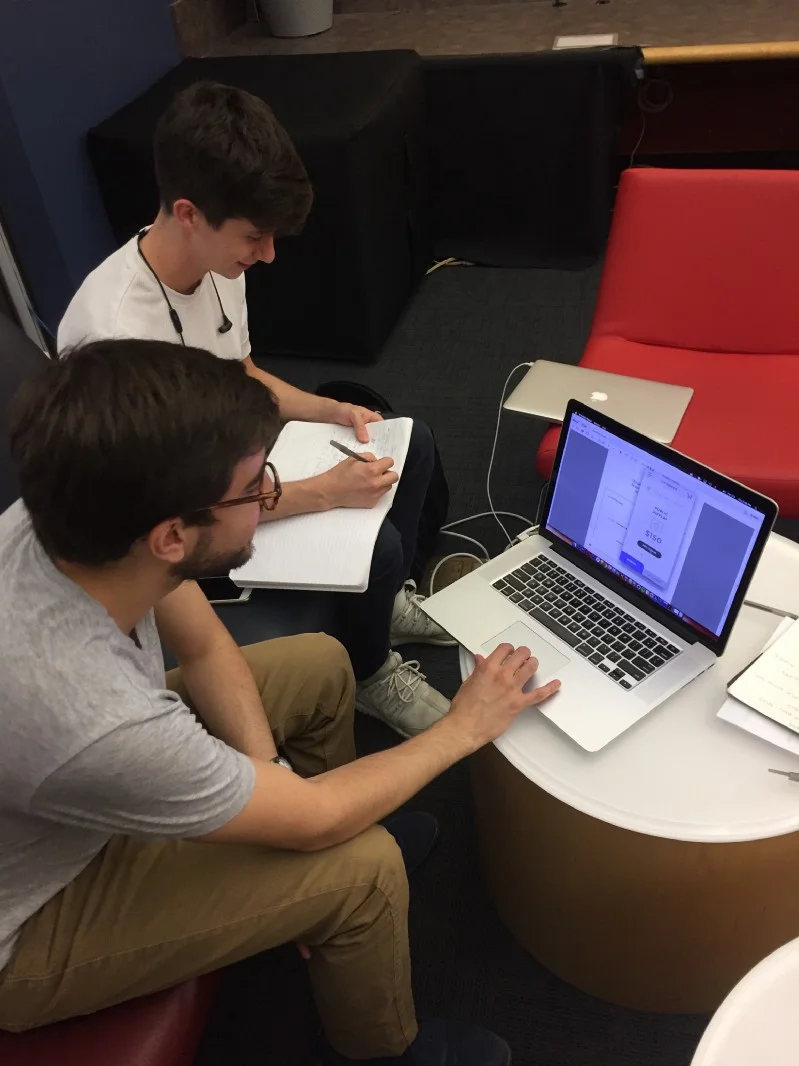 Team Blue conducting an interview with their prototype.