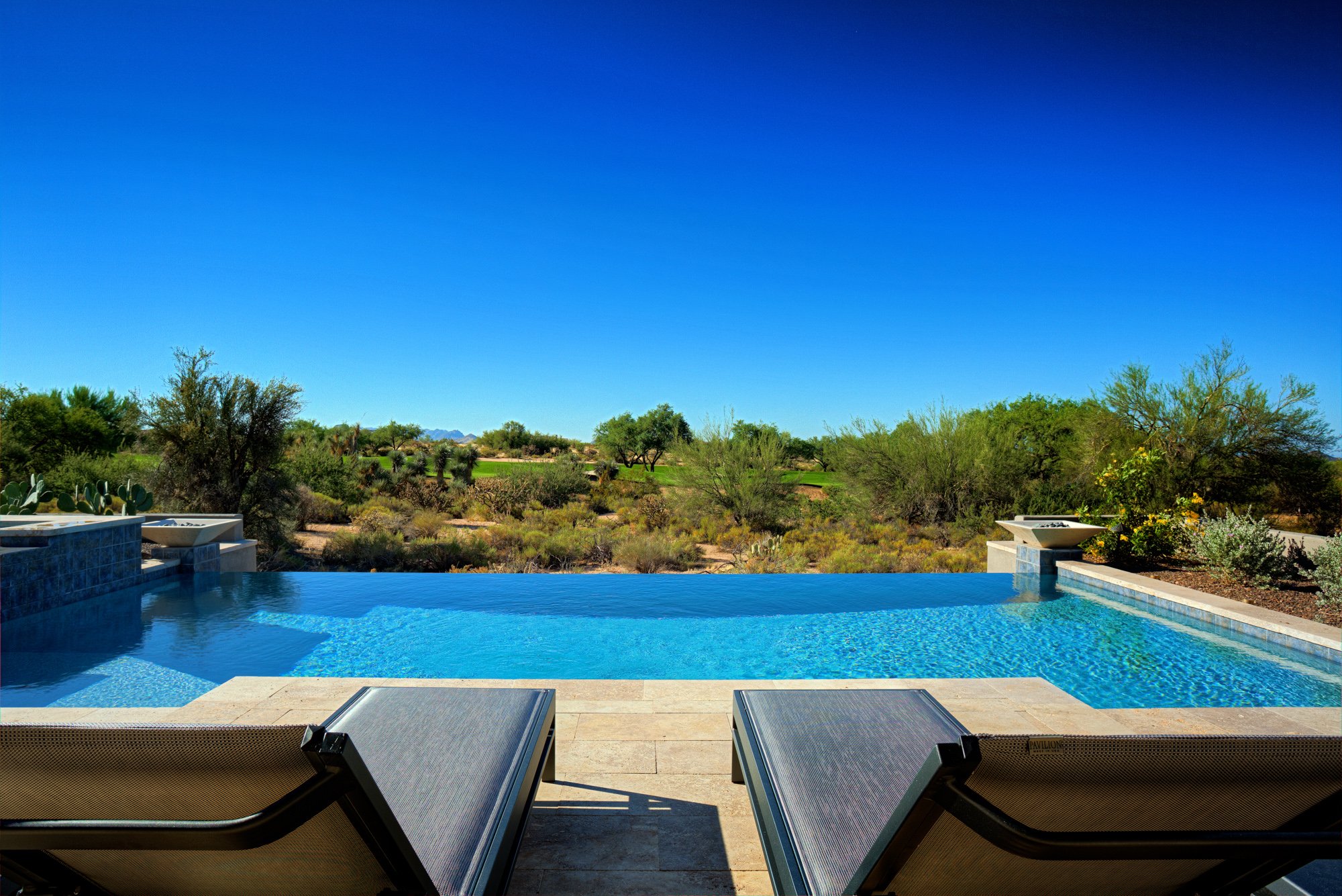 Infinity Edge Swimming Pool Designs — Presidential Pools, Spas & Patio