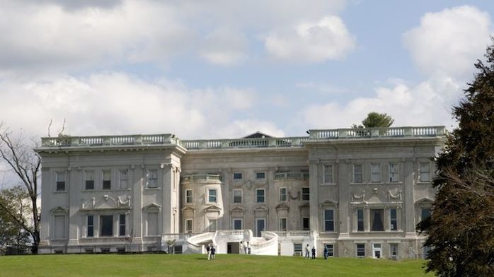View of the facade facing the river - the original mansion is the bottom two floors in the center section.