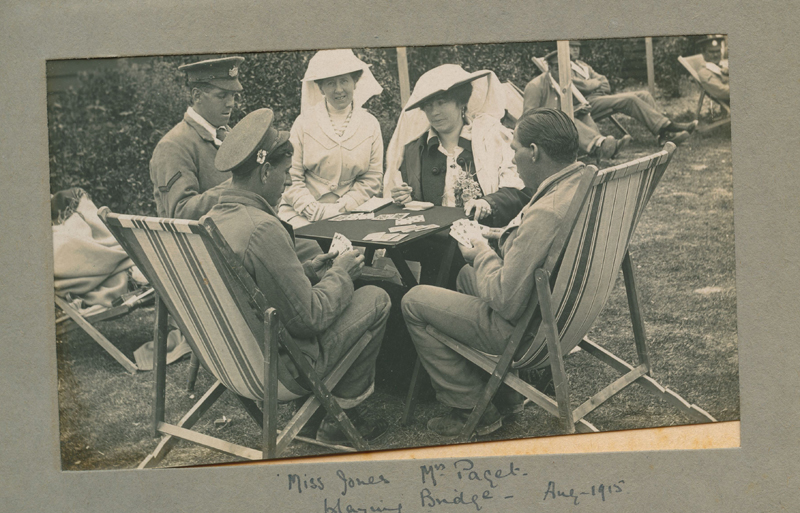 Pauline playing bridge with some convalescing soldiers