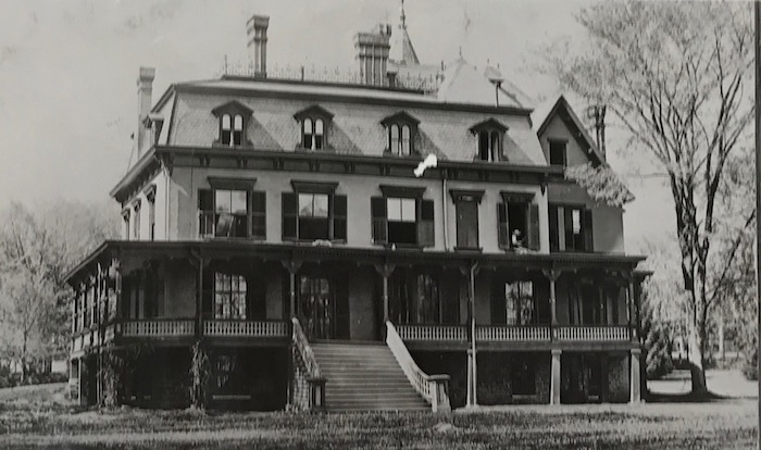 Lakeside of Holt Averill showing the original second empire villa