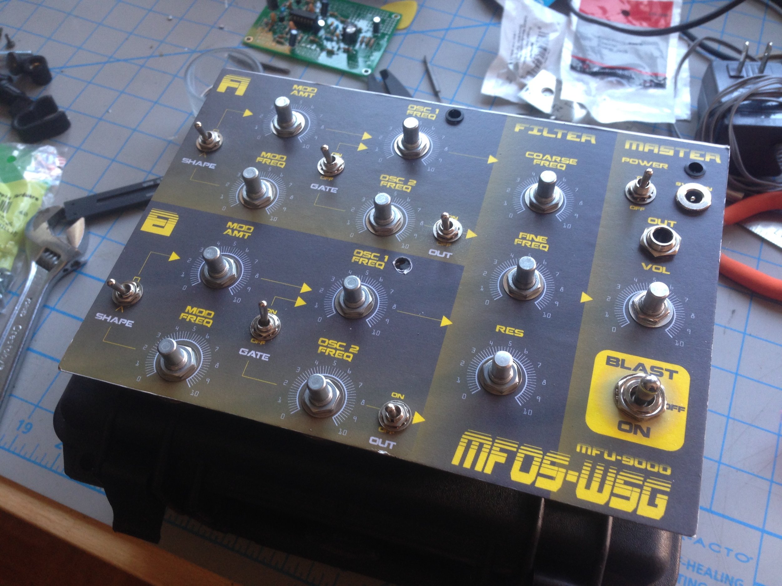 Control panel with knobs and switches installed