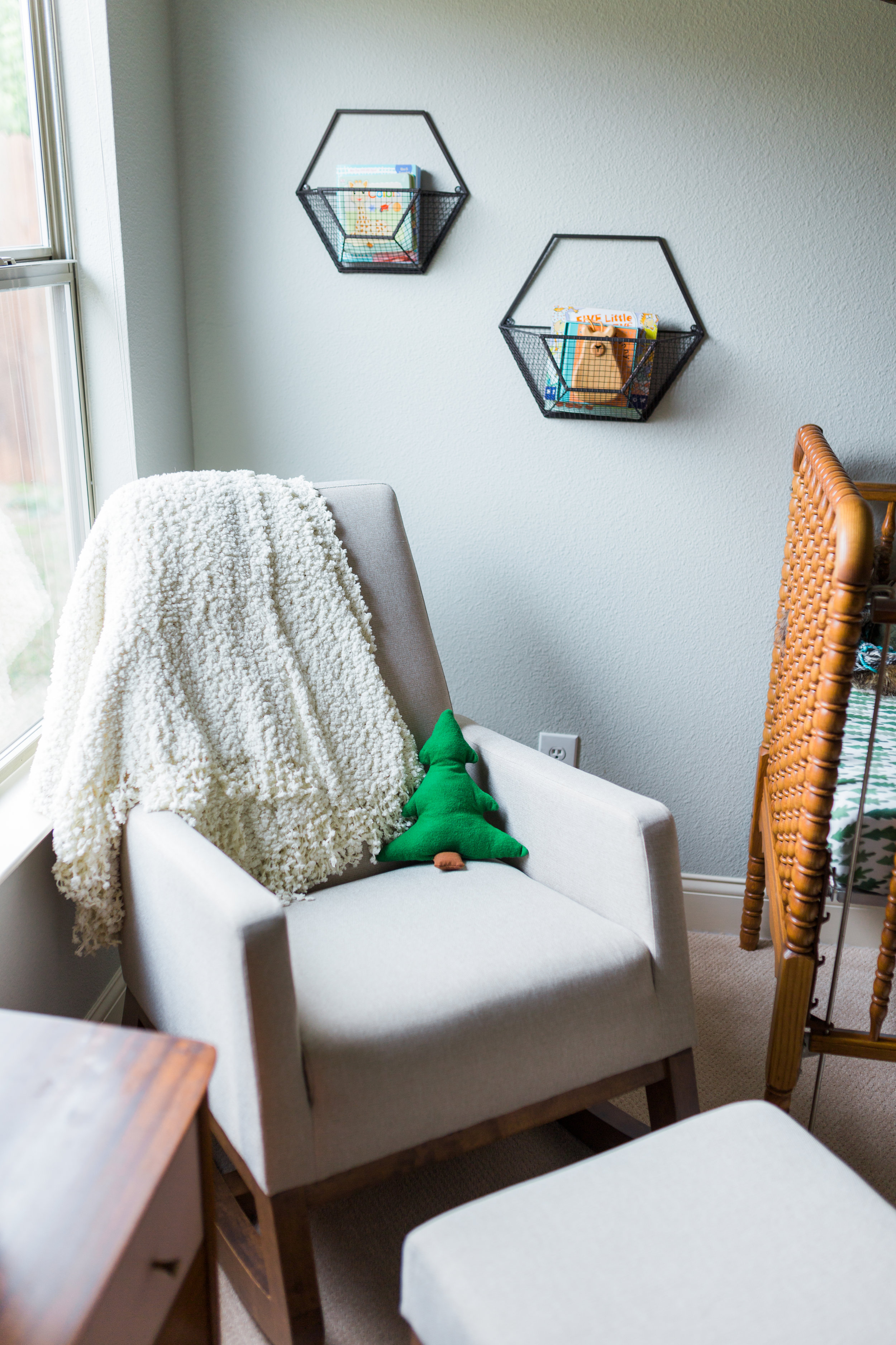 This chair and ottoman were gifts from my mom and I LOVE them! It's super comfy and supportive. I hand sewed the tree pillow - not a forte of mine! But I love how it came out. :) 
