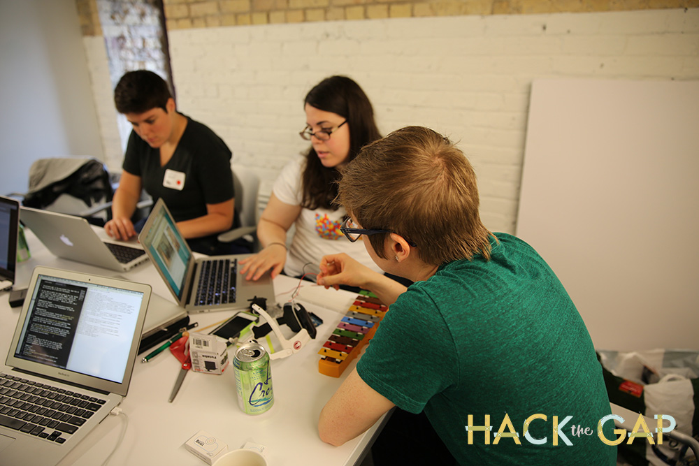 Team Neuro Visionaries hacking on their brainwave bio feedback project. 
