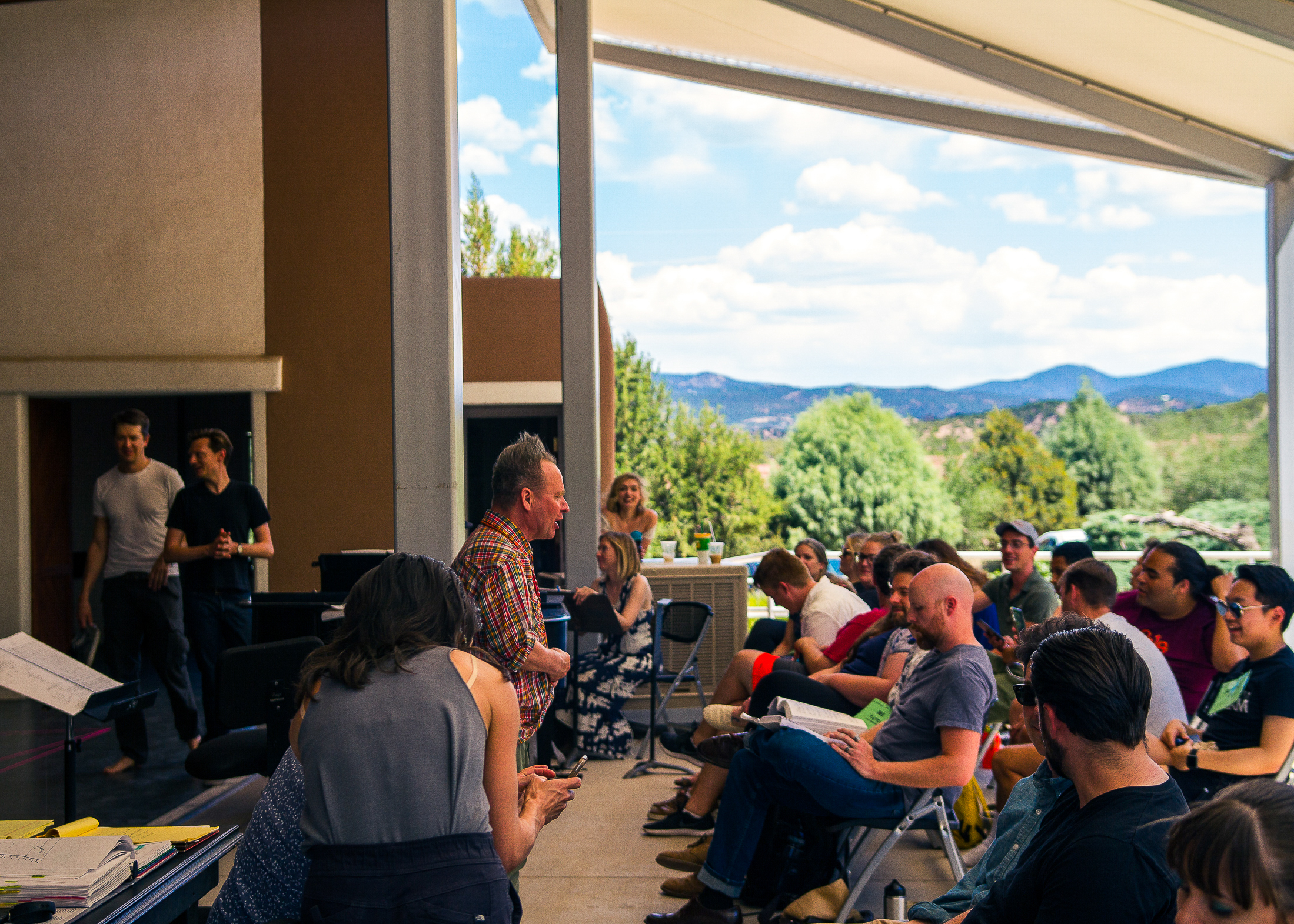  Peter Sellars addresses members of the Doctor Atomic cast before rehearsal. 