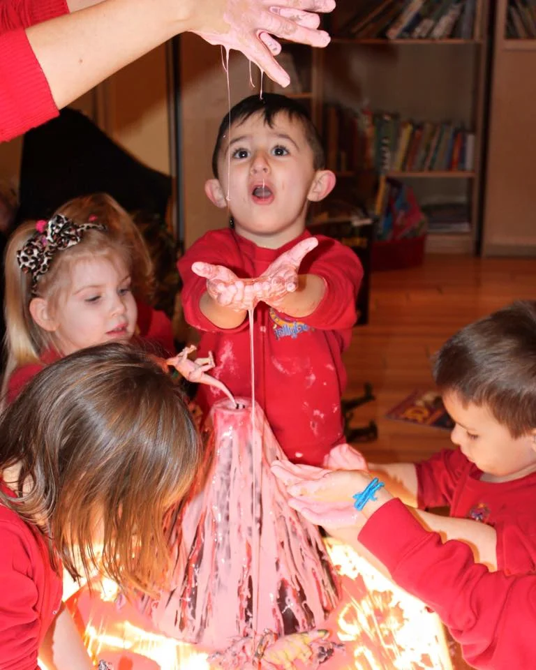 Exploring volcanoes in our dinosaur theme discovery lab.