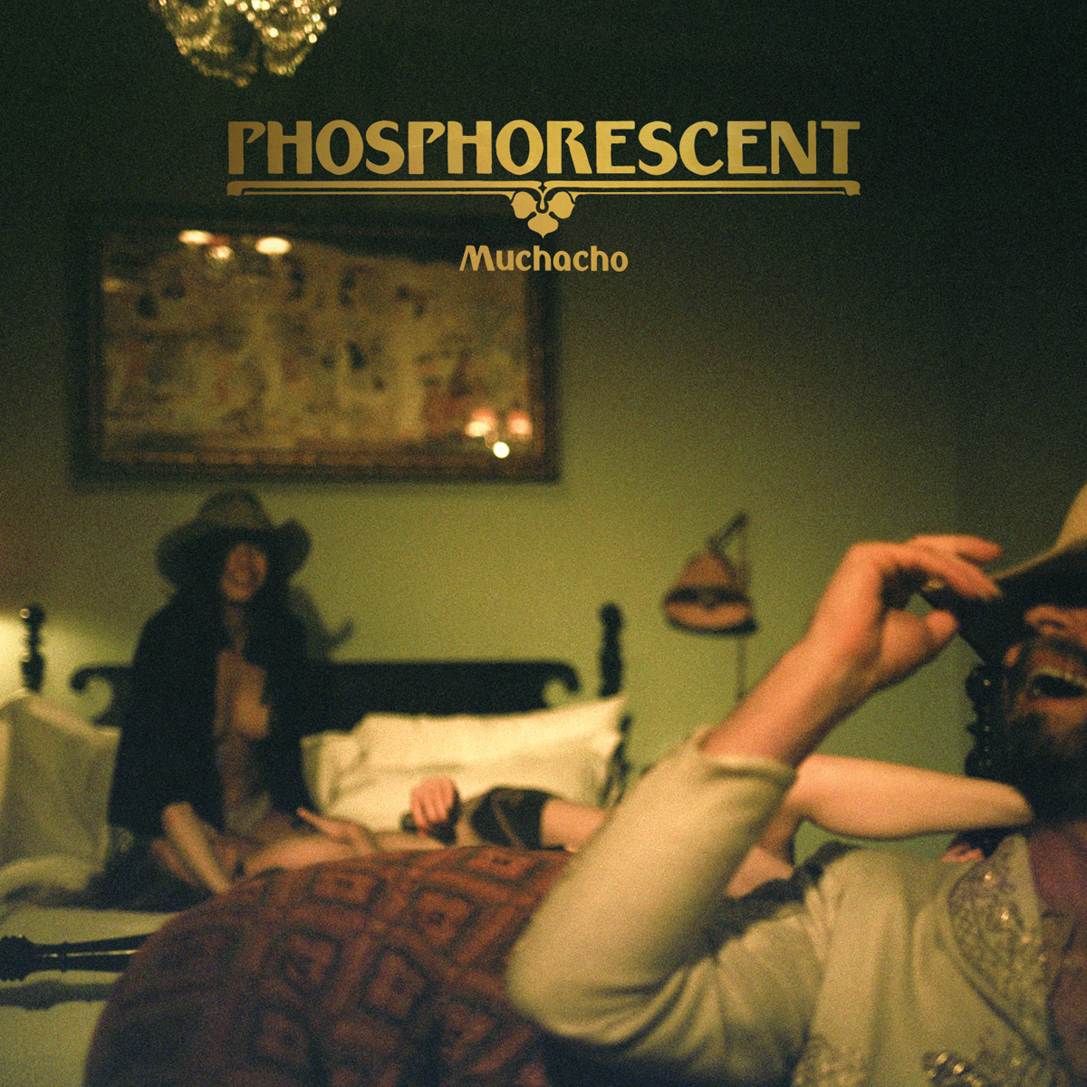 Album cover and interior artwork for Phosphorescent album "Muchacho"