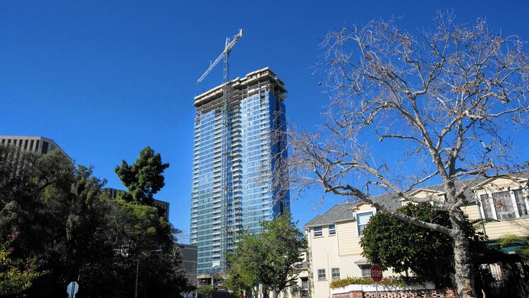  Miami developer Crescent Heights plans to open a 40-story luxury apartment tower this summer in Century City. It will have a private theater, on-call luxury cars with drivers and personal trainers. (Marcus Yam / Los Angeles Times) 