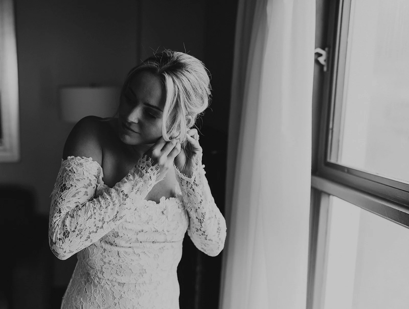 Bride and groom getting ready separately with their dogs in Telluride, Colorado