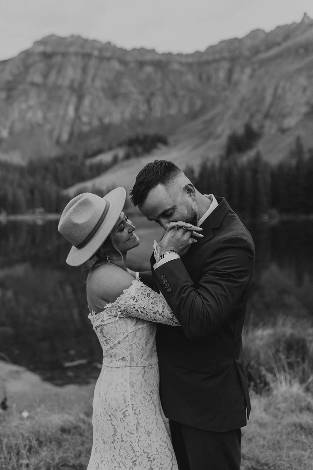 Intimate elopement ceremony at Alta Lakes in Telluride, Colorado with mountain backdrop