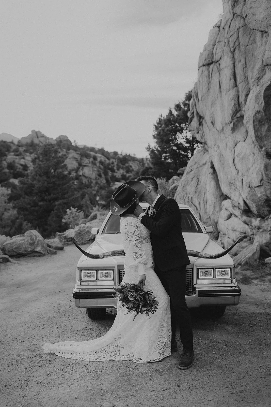 Couple kissing near the Midland Tunnels in Buena Vista Colorado with cinematic evening light