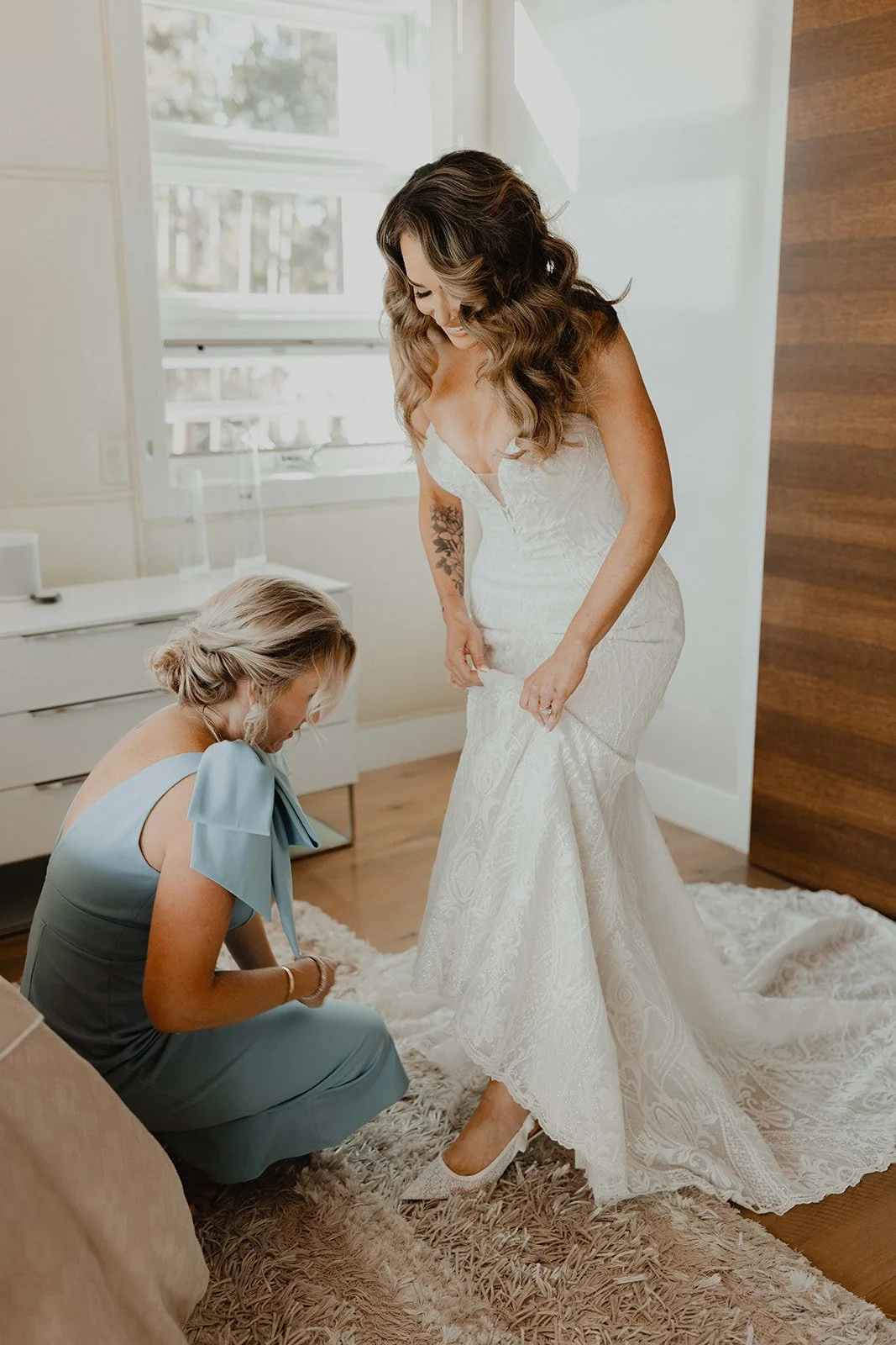 Bride getting ready at cabin Airbnb in Breckenridge Colorado before elopement