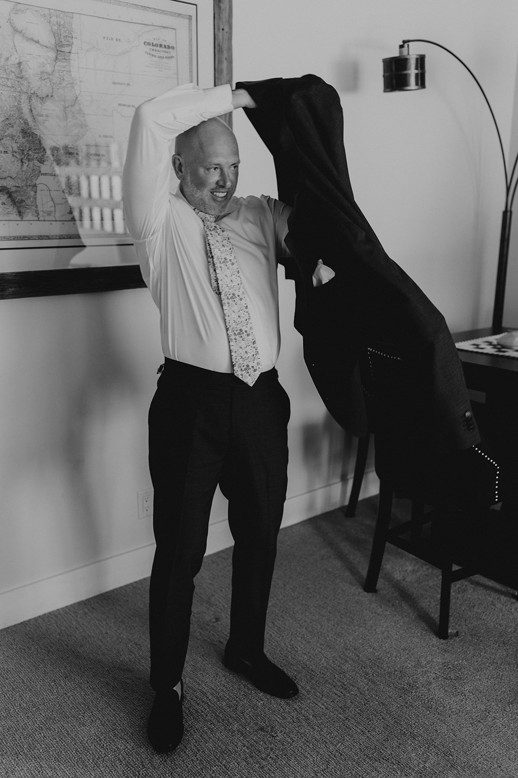 Groom getting ready with friends before Blue Lakes elopement in Breckenridge