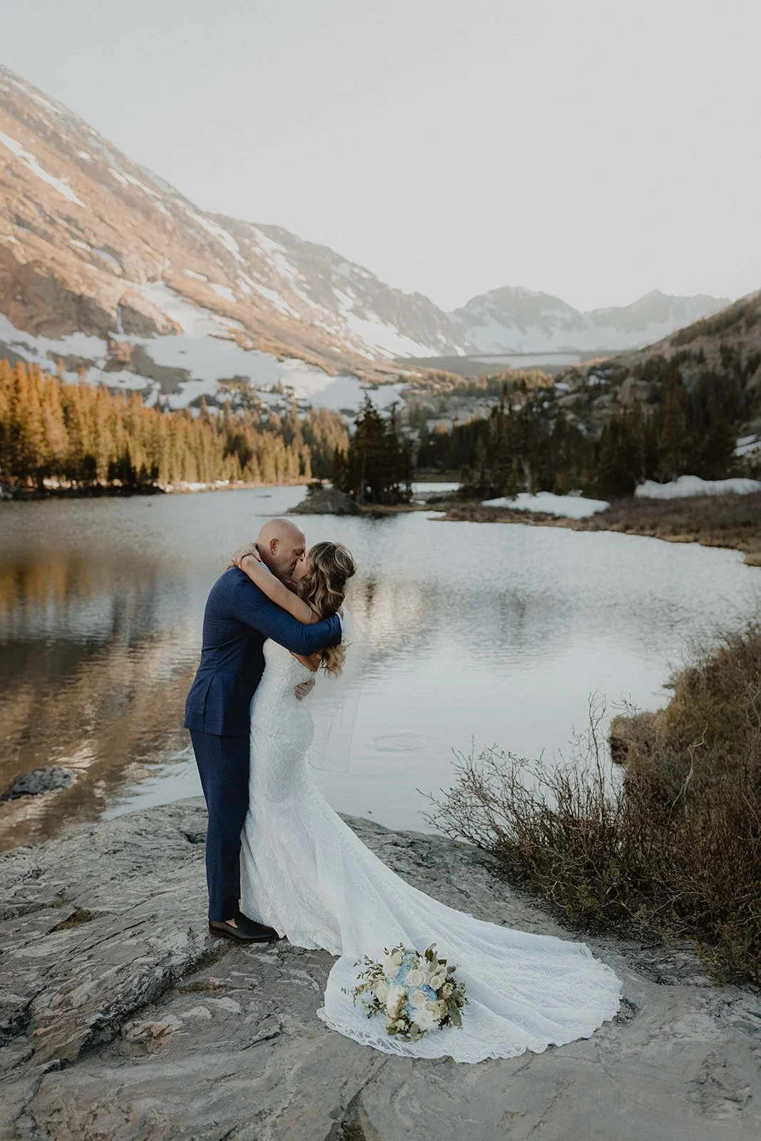 Intimate Blue Lakes elopement ceremony with mountain goats overlooking the cliffs
