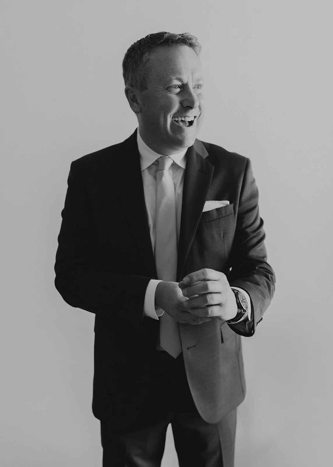 Con getting ready with his best friend before at the Surf Hotel in Buena Vista, Colorado elopement