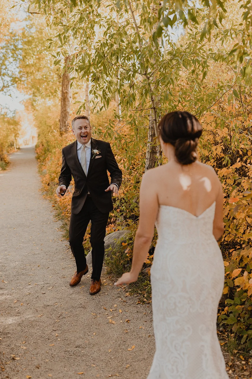 Golden cottonwoods surrounding Jill and Con’s first look in downtown Buena Vista, Colorado