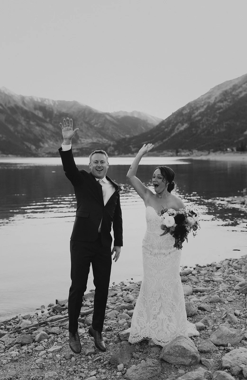 Couple dancing on the lakeshore during their intimate Twin Lakes elopement in Colorado