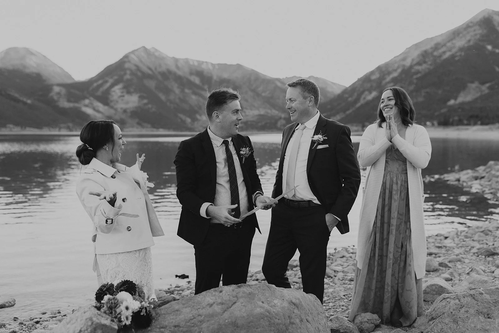 Jill and Con signing their marriage license beside Upper Twin Lake in Colorado