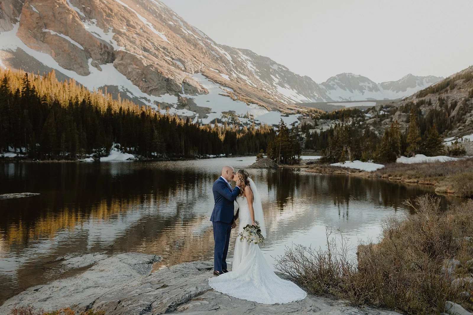 Elopement ceremony at Blue Lakes in Breckenridge Colorado with Mount Quandary backdrop