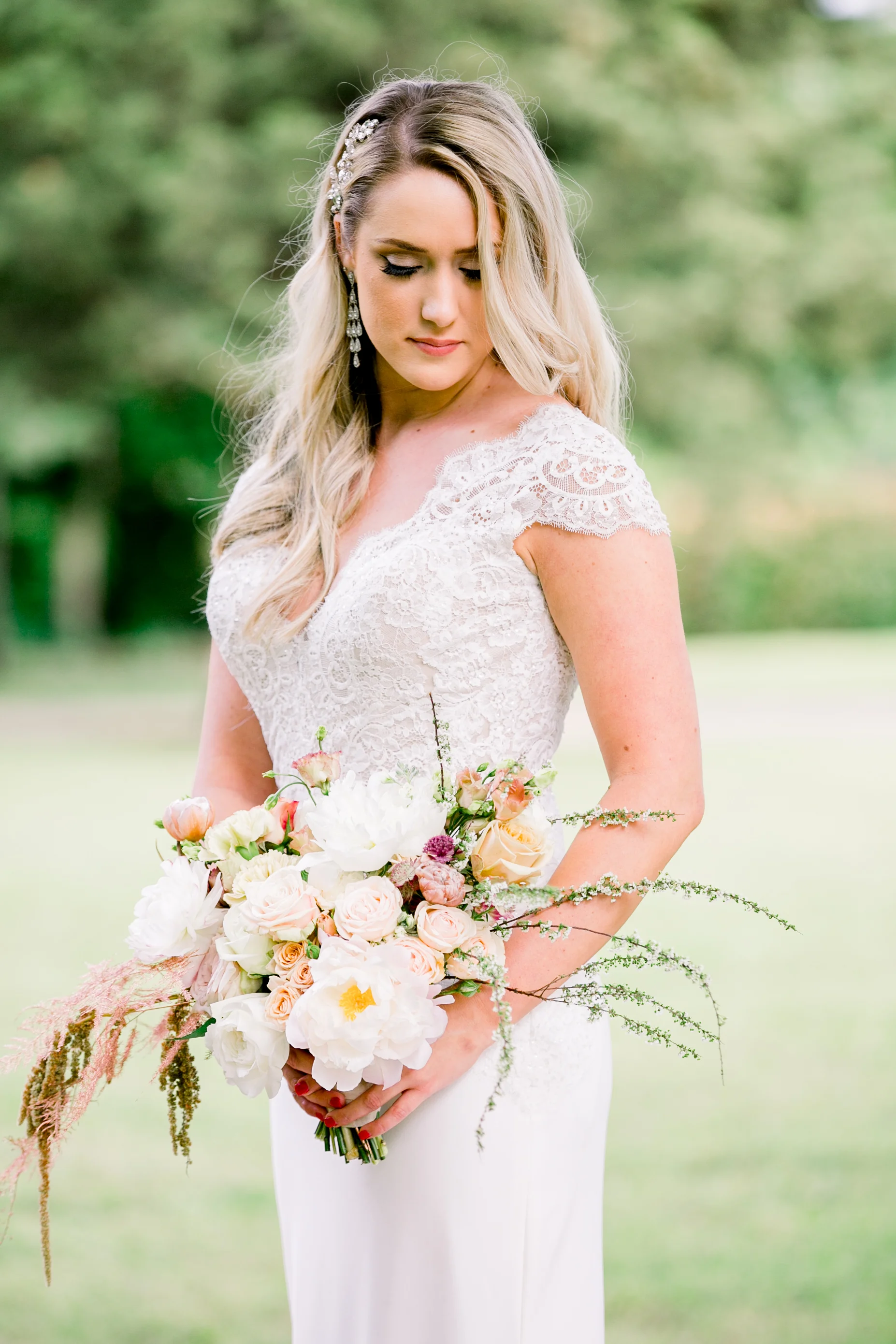 My jaw literally DROPPED when I saw the dress, flowers and stunning model all together! We were seriously blessed to work with so many talented Oklahoma artists!